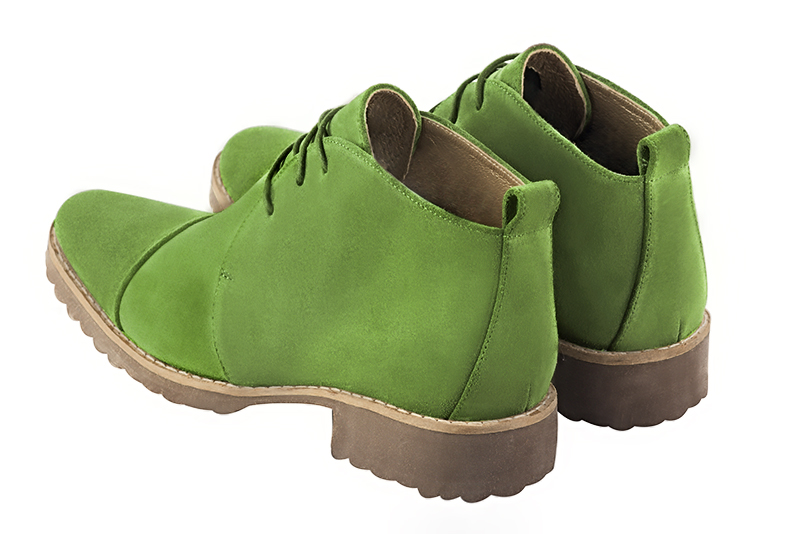 Grass green women's ankle boots with laces at the front. Round toe. Flat rubber soles. Rear view - Florence KOOIJMAN